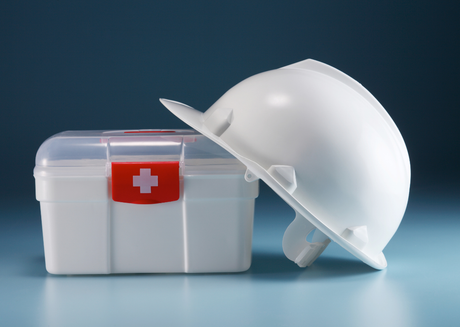 Construction safety helmet with medical kit