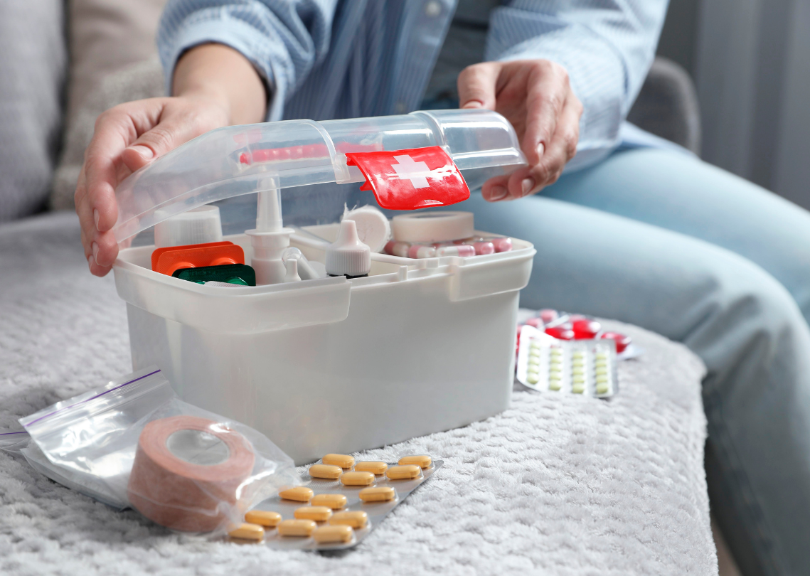 Women opening a first aid kit 