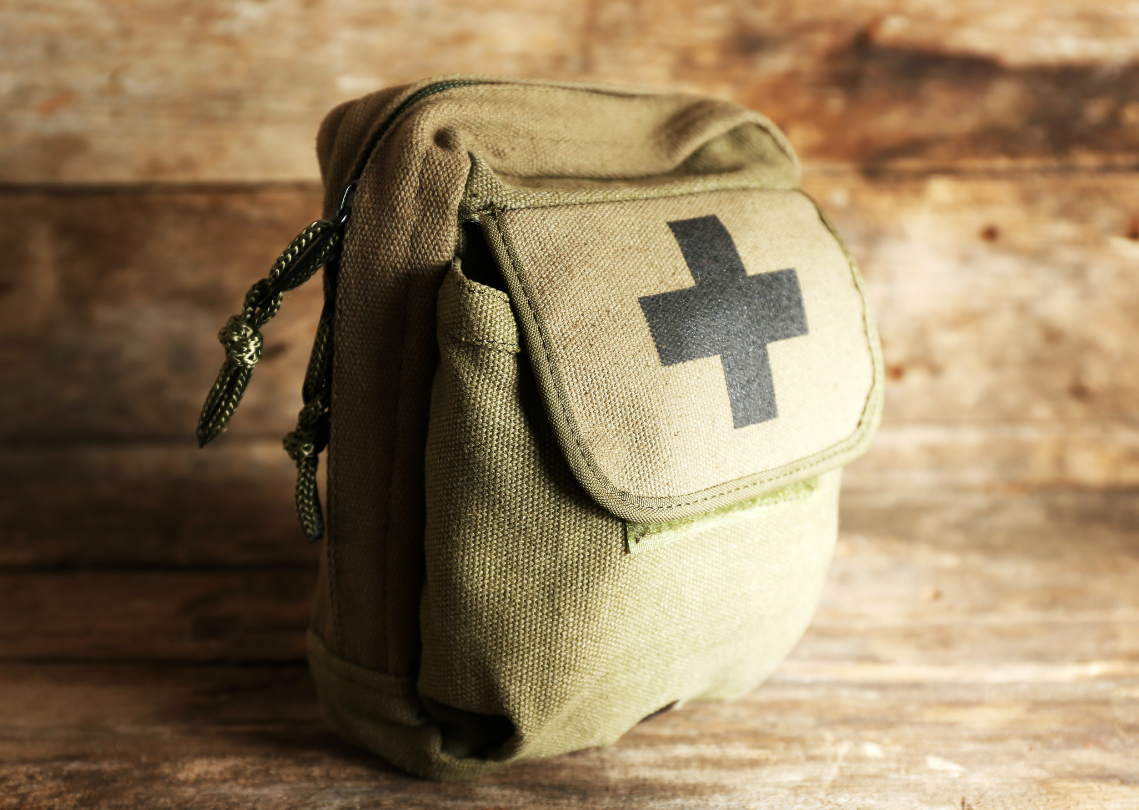 Small first aid pouch with cross symbol