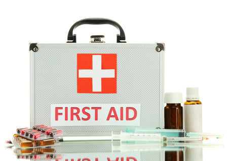 Silver first aid box with supplies