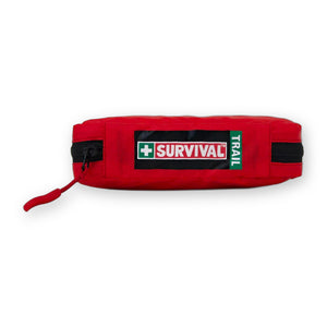 SURVIVAL Trail First Aid KIT Red, side view showing the SURVIVAL Trail label